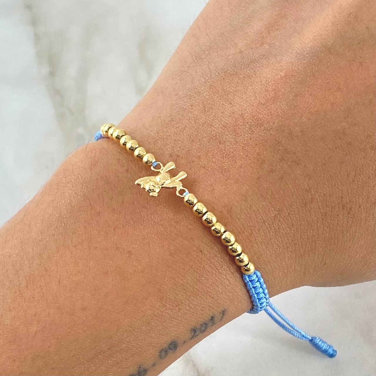 Pulsera Azul Herraje Oso Manito Arriba 1.15gr / 3mm Bolas Lisas 16und Oro Amarillo 18K *
