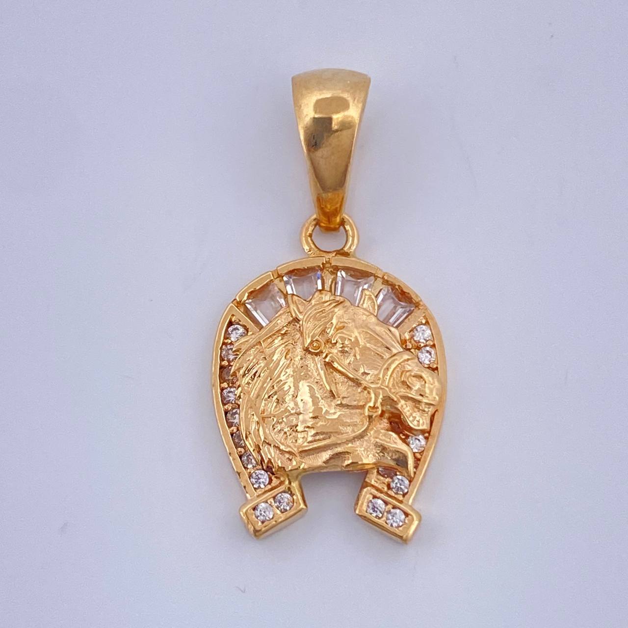 Dije Herradura Caballo 2.45gr / 1 in / Oro Amarillo 18K $