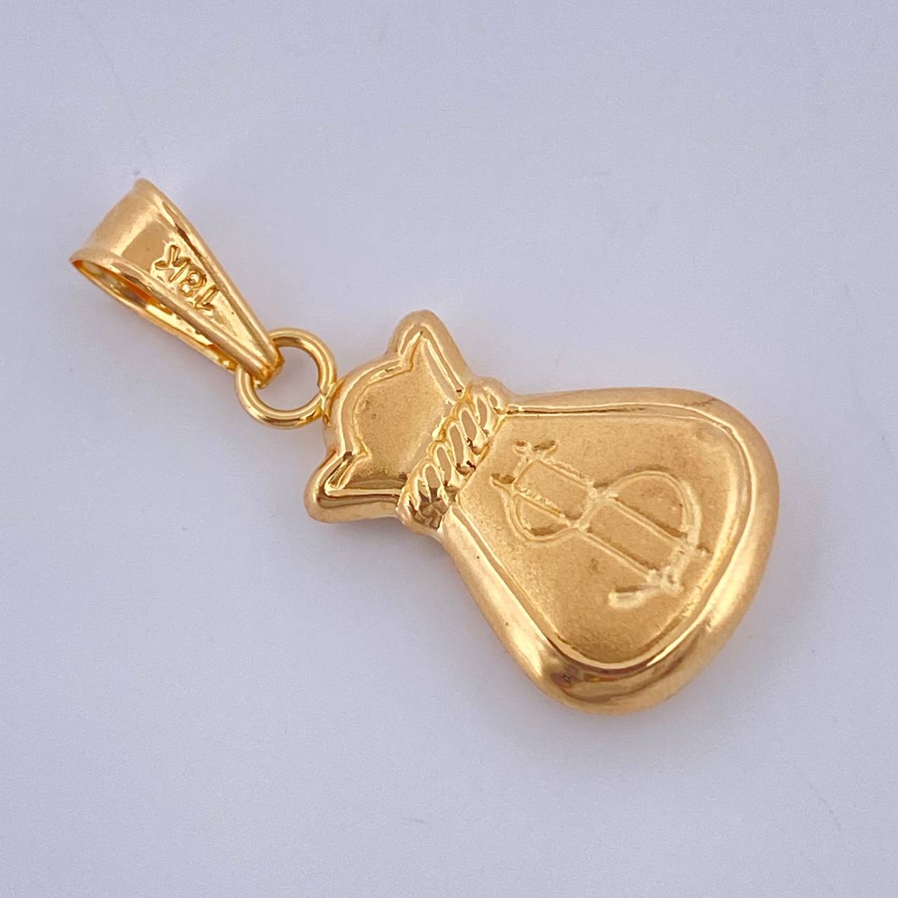 Dije Bolsa De Dinero 1.2gr / 1 1/4 in / Oro Amarillo 18K $