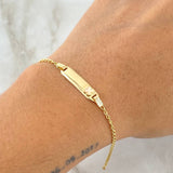 Pulso Bebé Espiga Placa Rectangular Trebol 1.7gr / 15cm-16cm / 1.6mm Resina Perlada Graduable Oro Amarillo 18K ©