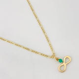 Set Cadena Figaro + Dije Infinito Esmeralda 0.06 pts / 1.75g / 18 in Oro Amarillo 18K
