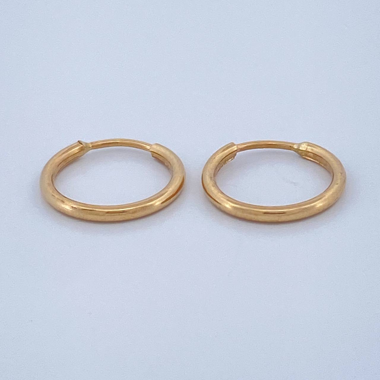 Candongas Aro Liso 0.55gr / 1/2 in / Oro Amarillo 18K $