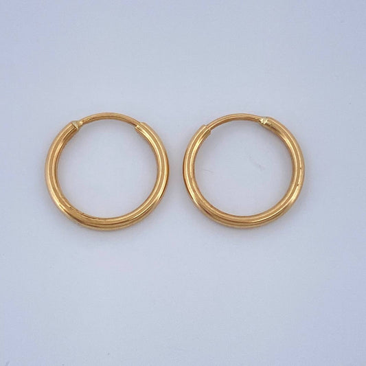 Candongas Aro Liso 0.55gr / 1/2 in / Oro Amarillo 18K $