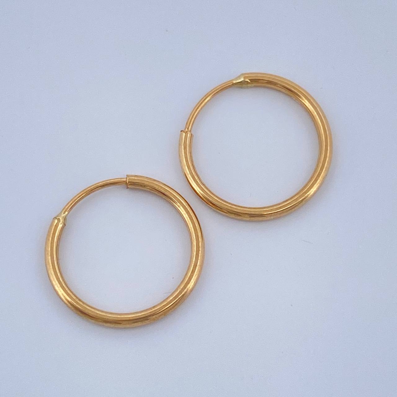 Candongas Aro Liso 0.65gr / 1/2 in / Oro Amarillo 18K $