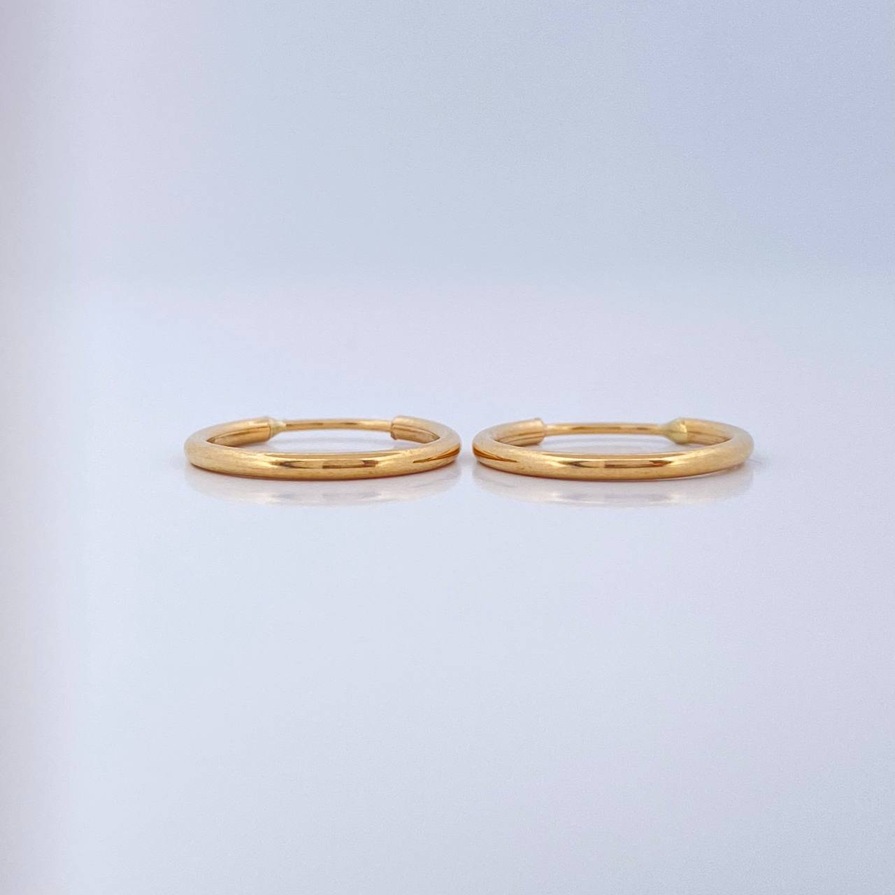 Candongas Aro Liso 0.65gr / 1/2 in / Oro Amarillo 18K $