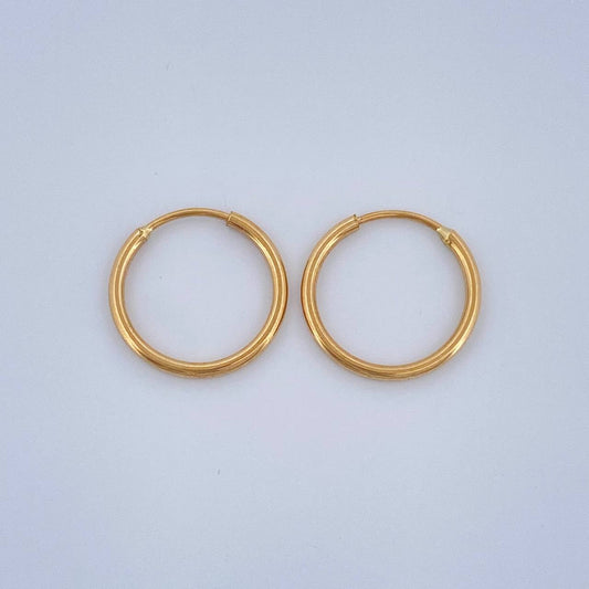 Candongas Aro Liso 0.65gr / 1/2 in / Oro Amarillo 18K $