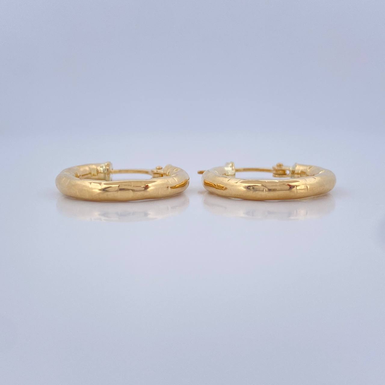 Candongas Lucero 1.7gr / 3/4 in / Oro Amarillo 18K $