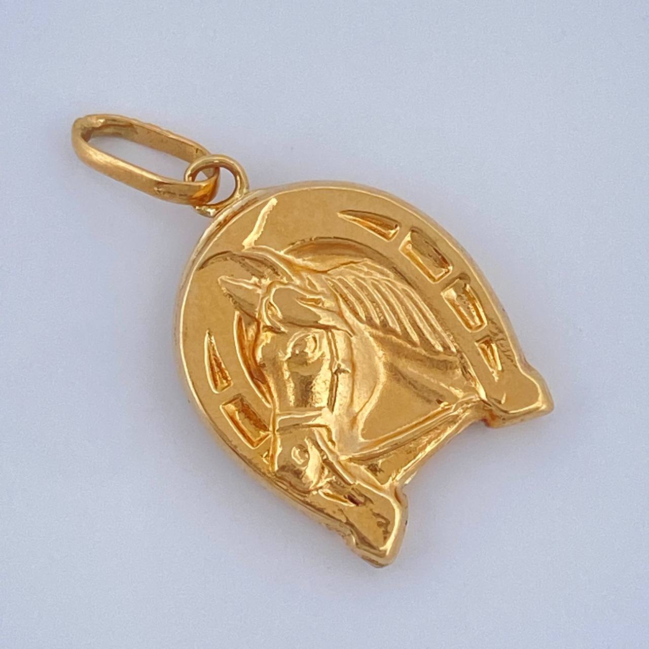 Dije Herradura Caballo 0.95gr / 1 in / Oro Amarillo 18K $