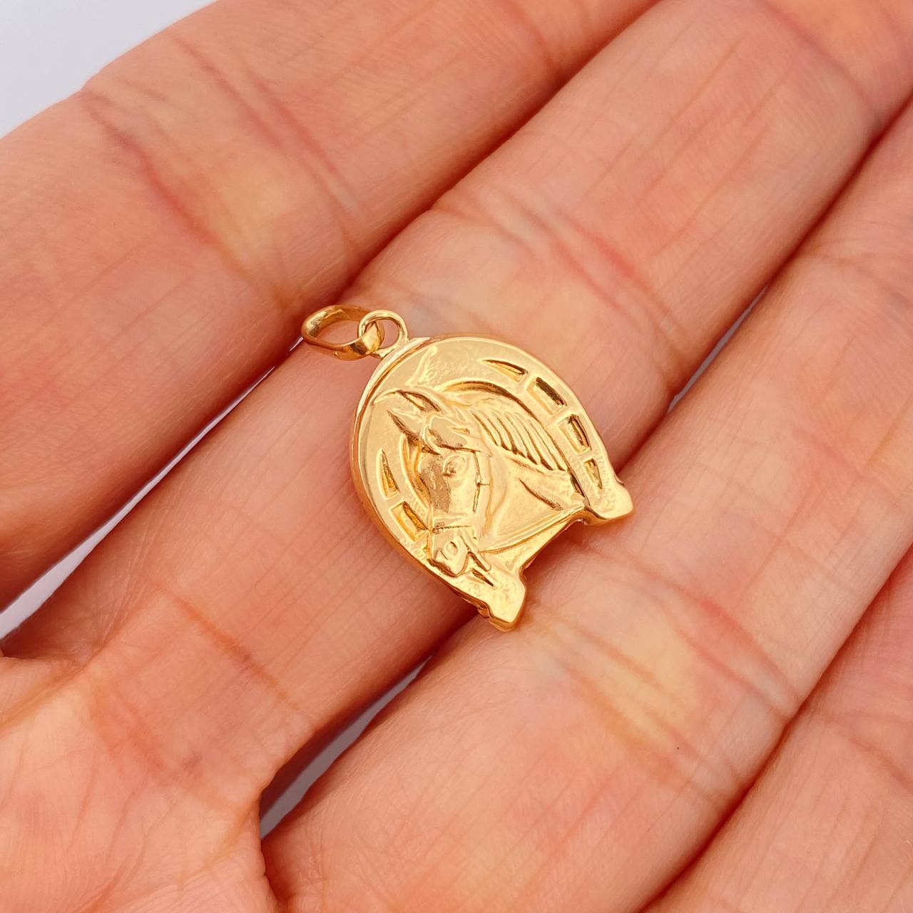 Dije Herradura Caballo 0.95gr / 1 in / Oro Amarillo 18K $