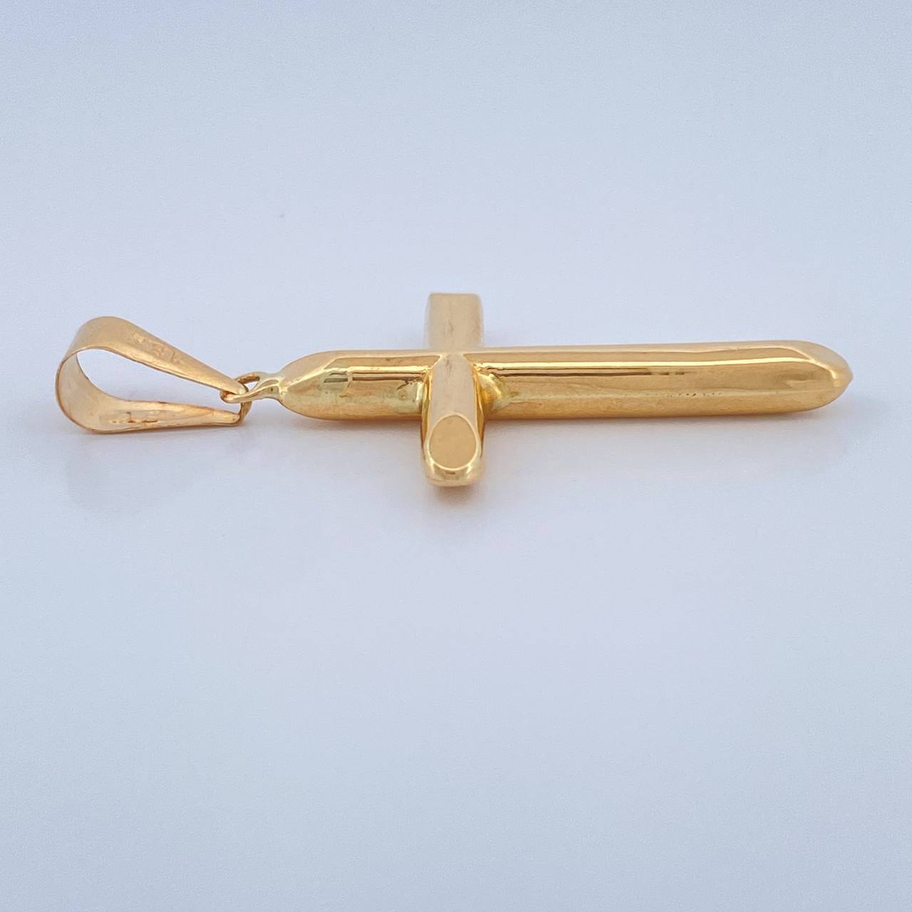 Dije Cruz 1.6gr / 1 3/4 in / Oro Amarillo 18K $
