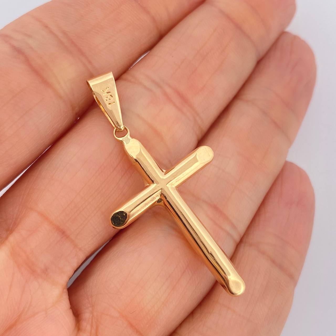 Dije Cruz 1.6gr / 1 3/4 in / Oro Amarillo 18K $