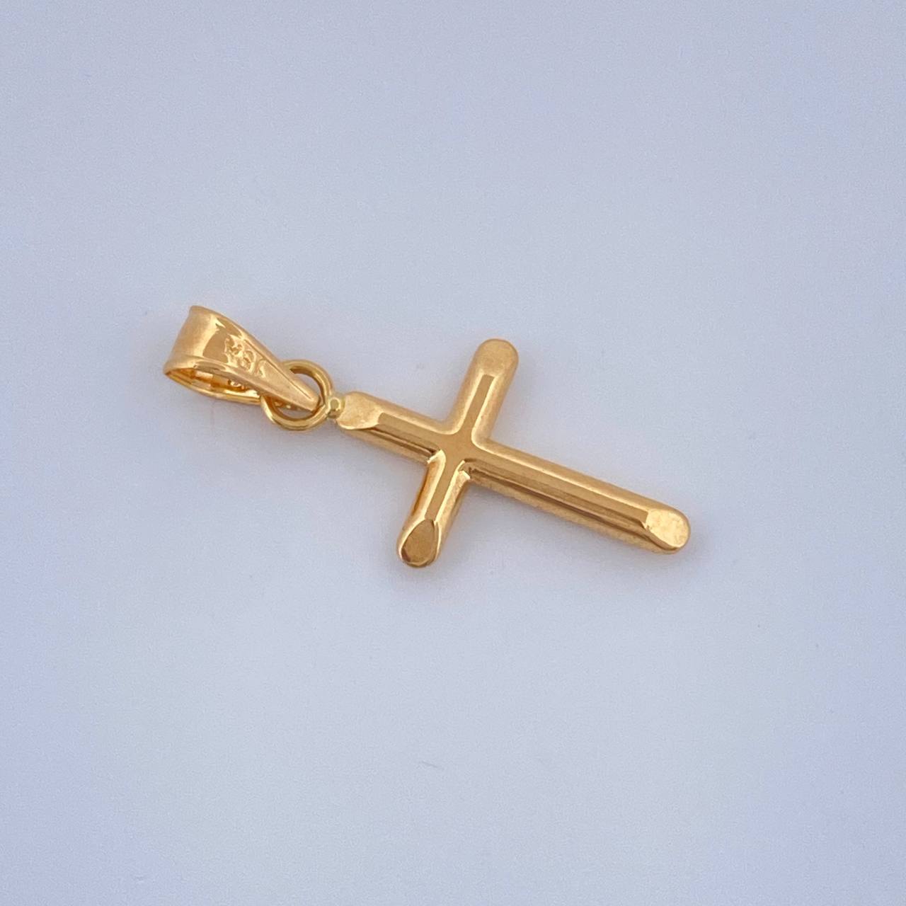 Dije Cruz 0.4gr / 1 in / Oro Amarillo 18K $