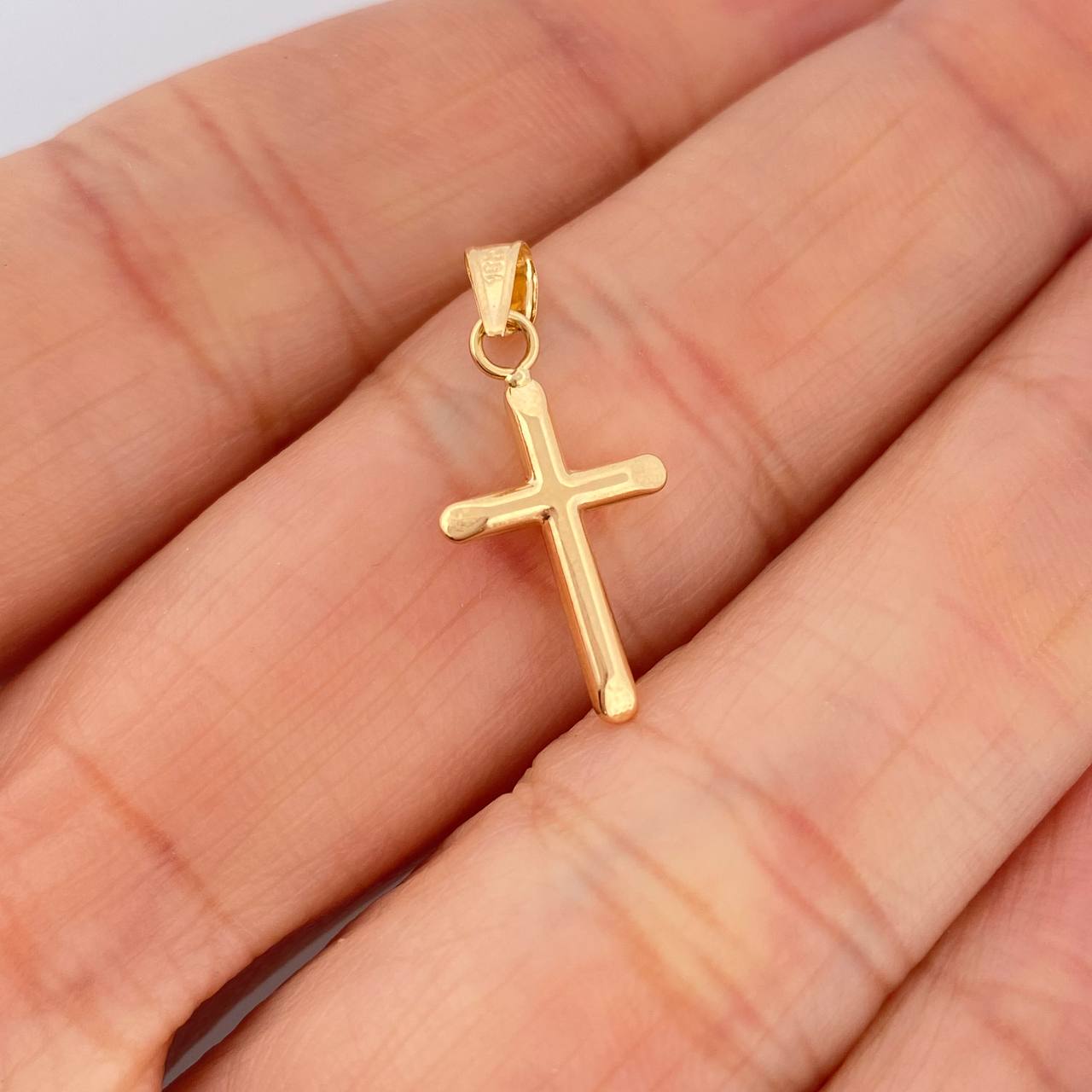 Dije Cruz 0.4gr / 1 in / Oro Amarillo 18K $