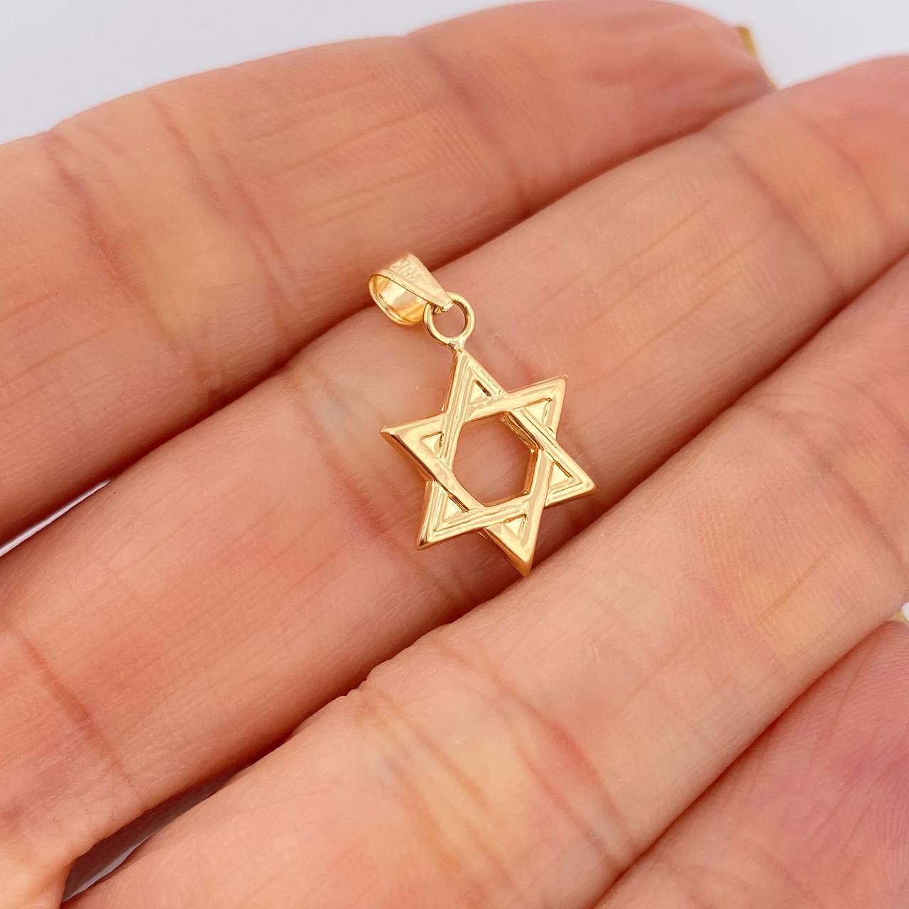 Dije Estrella De David 0.55gr / 3/4 in / Oro Amarillo 18K $