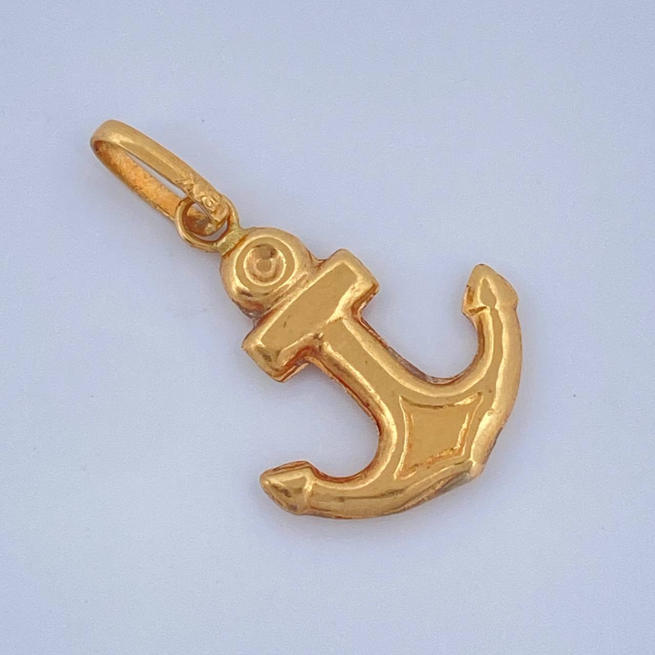 Dije Ancla 0.7gr / 1 in / Oro Amarillo 18K $
