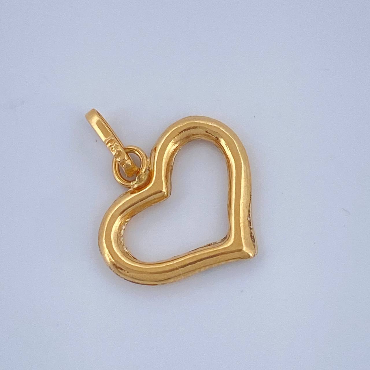 Dije Silueta Corazon 0.45gr / 3/4 in / Oro Amarillo 18K $
