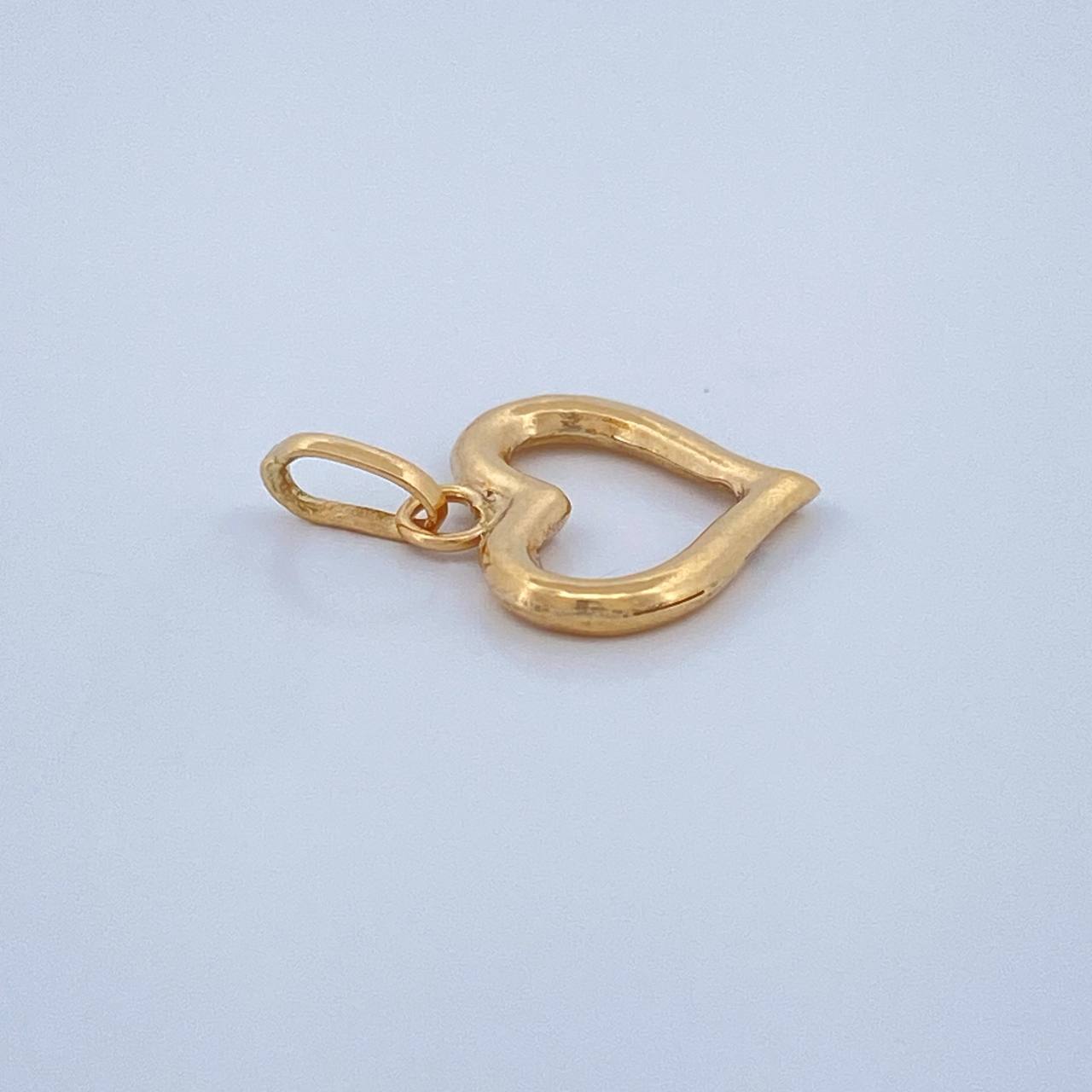 Dije Silueta Corazon 0.45gr / 3/4 in / Oro Amarillo 18K $