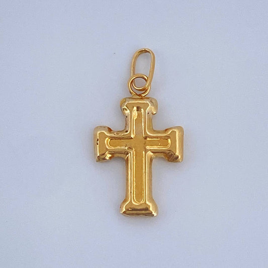 Dije Cruz 0.4gr / 3/4 in / Oro Amarillo 18K $