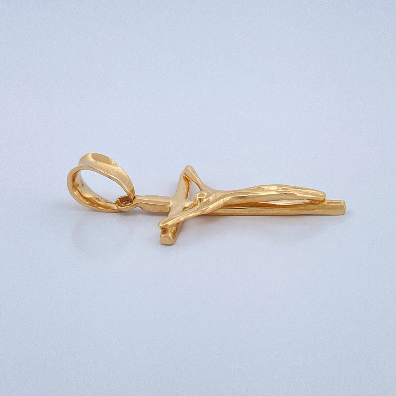 Dije Cruz Cristo 1.2gr / 1 in / Oro Amarillo 18K $