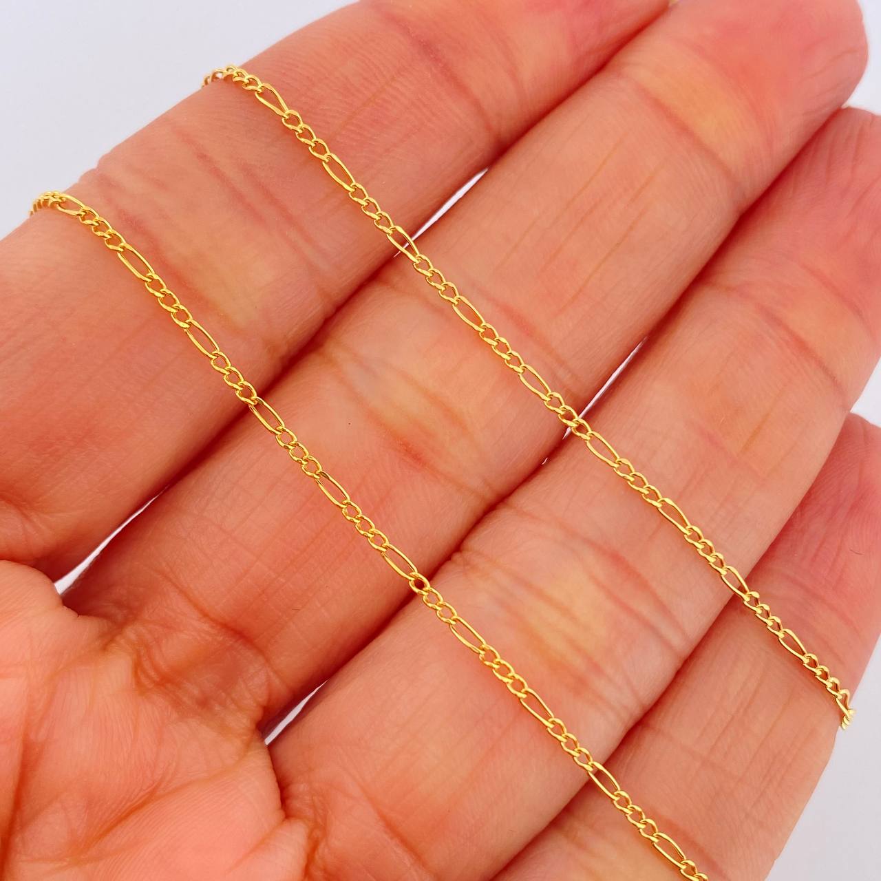 Figaro Chain 1.1gr / 19 3/4 in / 1.1mm Yellow Gold +1 18K &