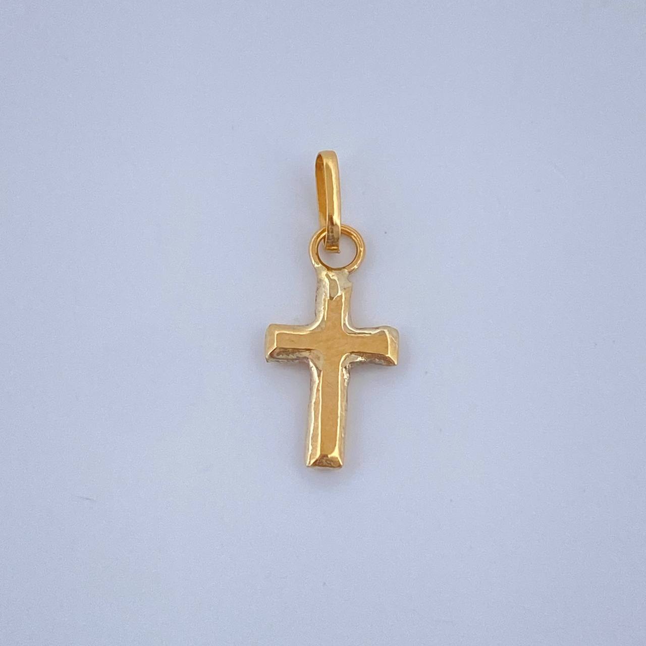 Dije Cruz 0.15gr / 1/2 in / Oro Amarillo 18K &
