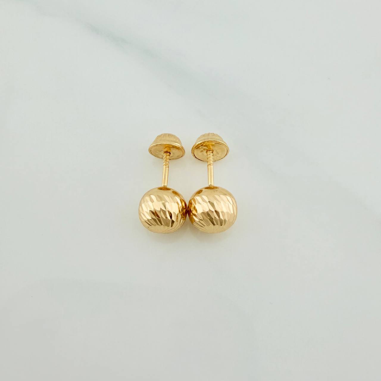 Topos Bola 0.85gr / 7mm Oro Amarillo 18K %