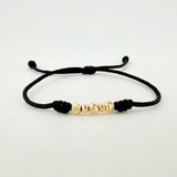 Pulsera Tejida Negra Bolas Diamantadas/ Lisas Oro Amarillo 18K
