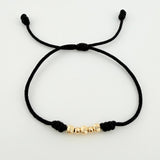 Pulsera Tejida Negra Bolas Diamantadas/ Lisas Oro Amarillo 18K