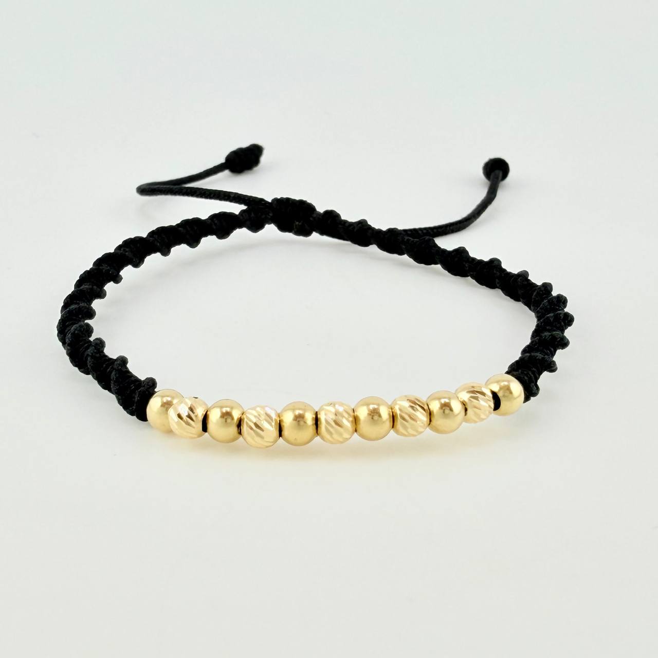 Black Woven Bracelet with Diamond Cut/Plain Beads in 18K Yellow Gold