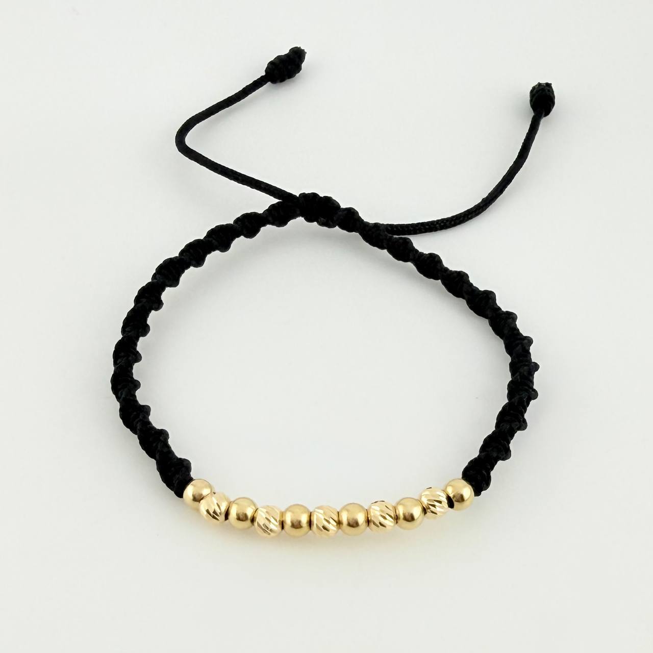 Black Woven Bracelet with Diamond Cut/Plain Beads in 18K Yellow Gold