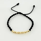Black Woven Bracelet with Diamond Cut/Plain Beads in 18K Yellow Gold