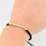 Black Woven Bracelet with Diamond Cut/Plain Beads in 18K Yellow Gold