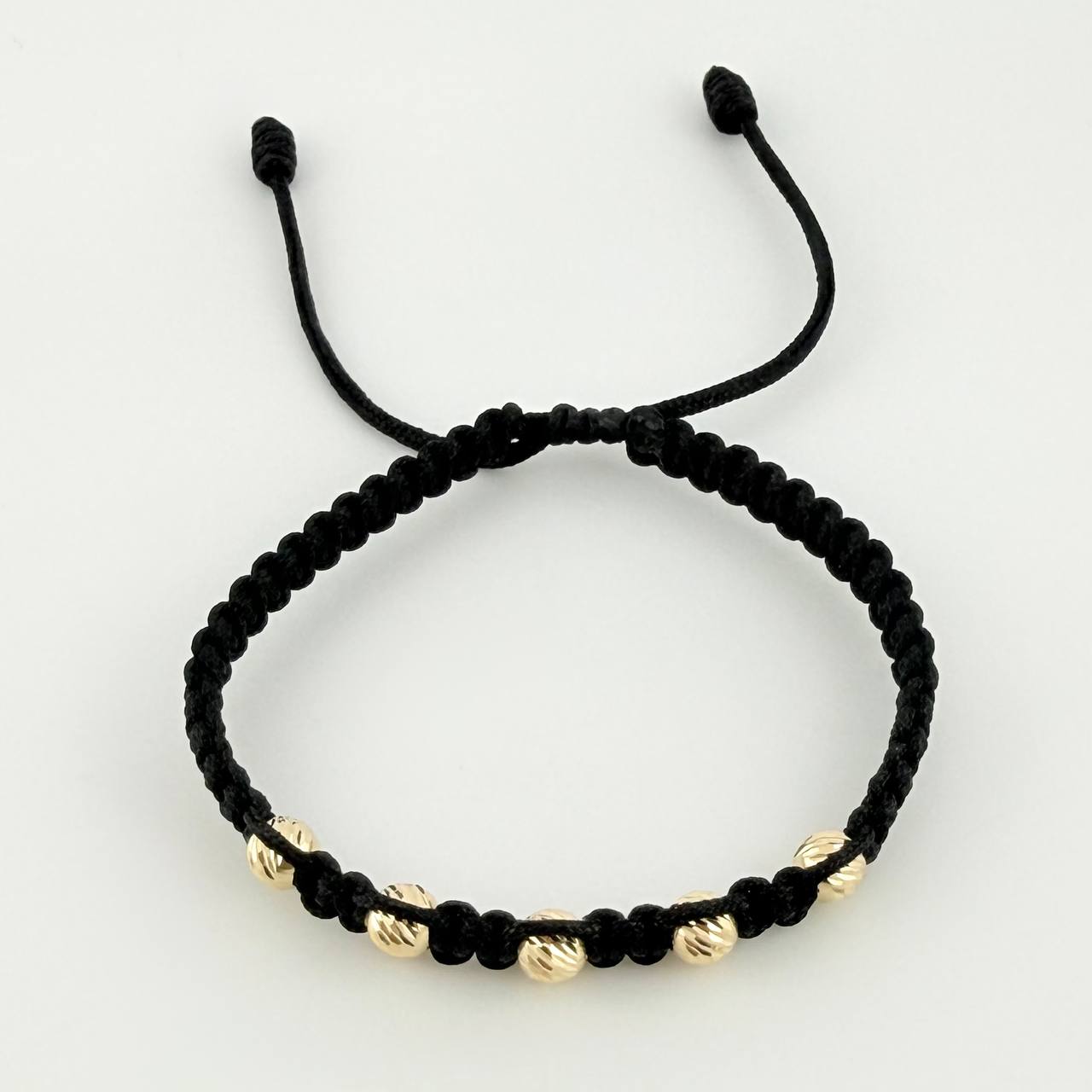 Pulsera Tejida Negra Bolas Diamantadas Oro Amarillo 18K