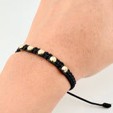 Pulsera Tejida Negra Bolas Diamantadas Oro Amarillo 18K