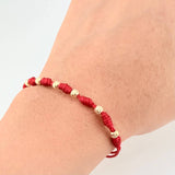 Pulsera Tejida Roja Siete Nudos Bolas Diamantadas Oro Amarillo 18K