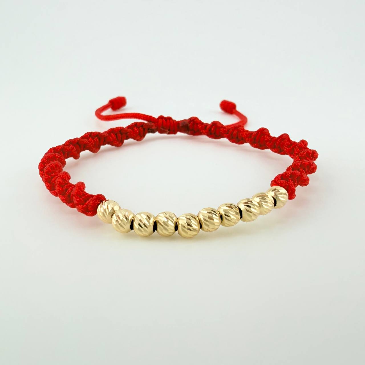 Red Woven Bracelet with Diamond Cut Beads in 18K Yellow Gold