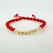 Red Woven Bracelet with Diamond Cut Beads in 18K Yellow Gold