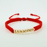 Pulsera Tejida Roja Bolas Lisas Oro Amarillo 18K
