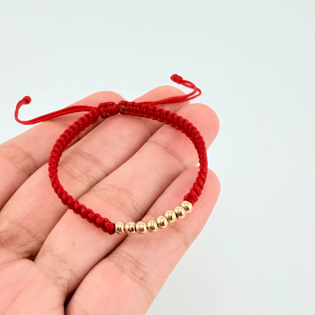 Pulsera Tejida Roja Bolas Lisas Oro Amarillo 18K