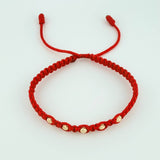 Red Woven Bracelet with Diamond Cut Beads in 18K Yellow Gold