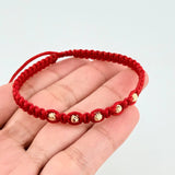 Red Woven Bracelet with Diamond Cut Beads in 18K Yellow Gold
