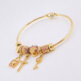 Pulso PD Minnie-Cruz-Llave-Cruz-Corazón 16gr / 7 in / Oro Amarillo 18K