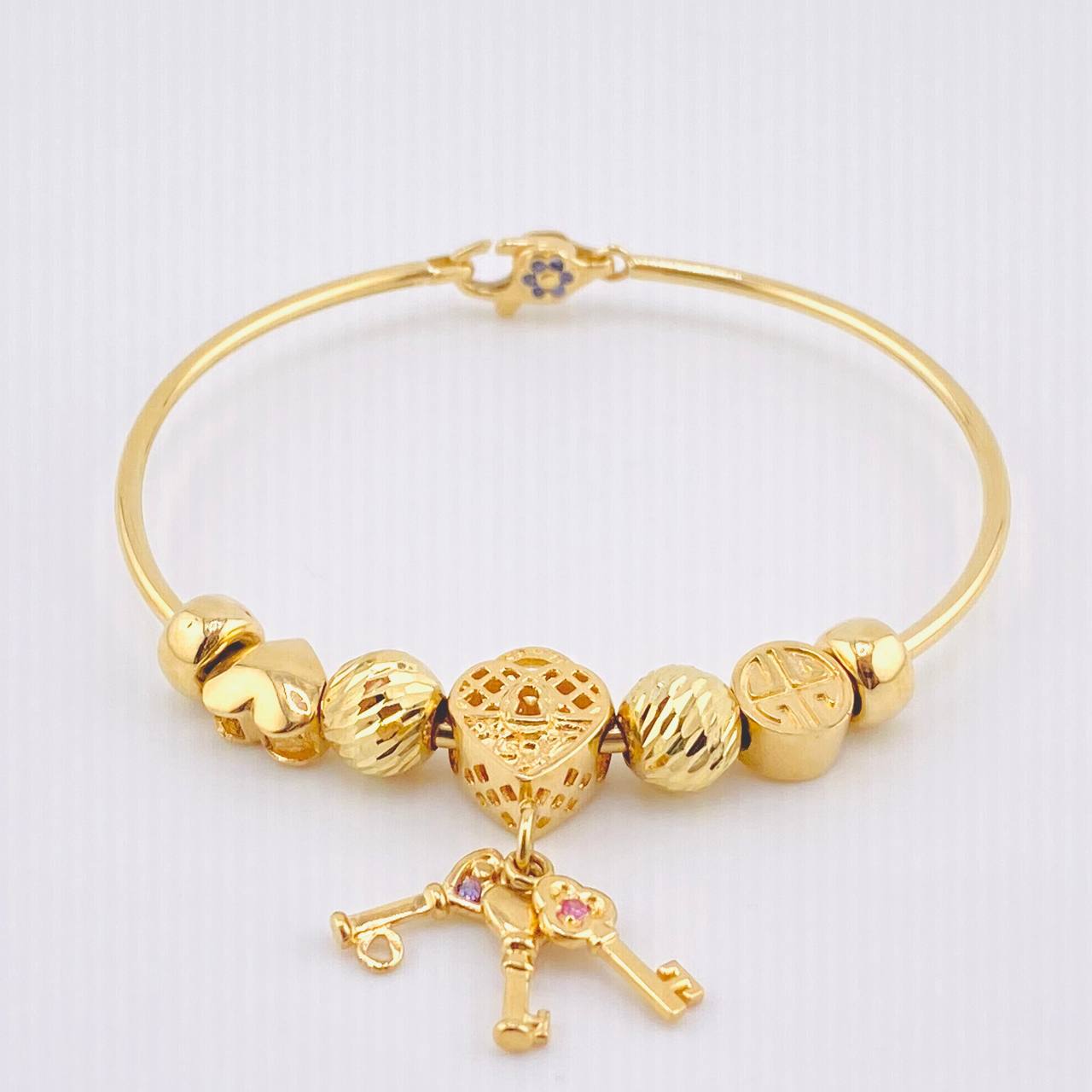 Pulso PD Llave Corazón Bolas Diamantadas 13.55gr / 7 in / Oro Amarillo 18K ©