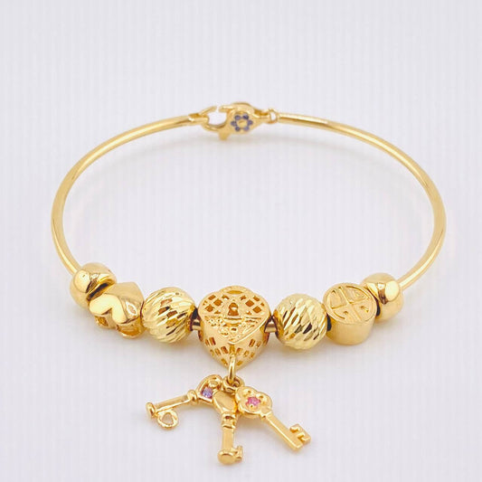 Pulso PD Llave Corazón Bolas Diamantadas 13.55gr / 7 in / Oro Amarillo 18K ©