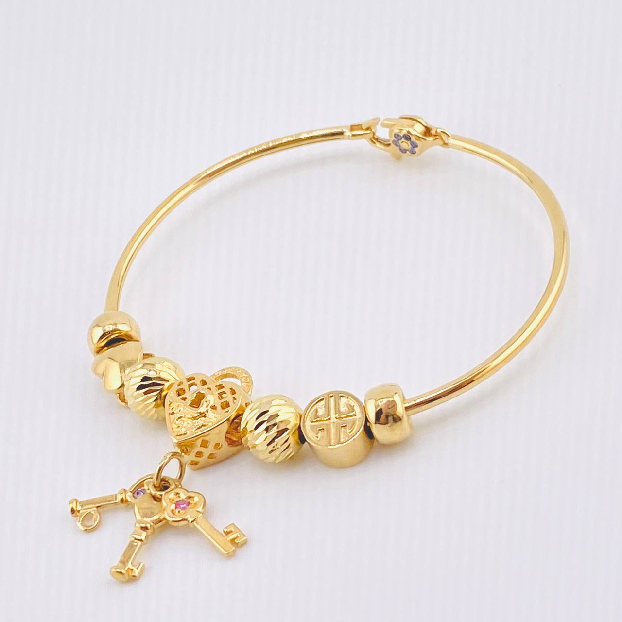 Pulso PD Llave Corazón Bolas Diamantadas 13.55gr / 7 in / Oro Amarillo 18K ©