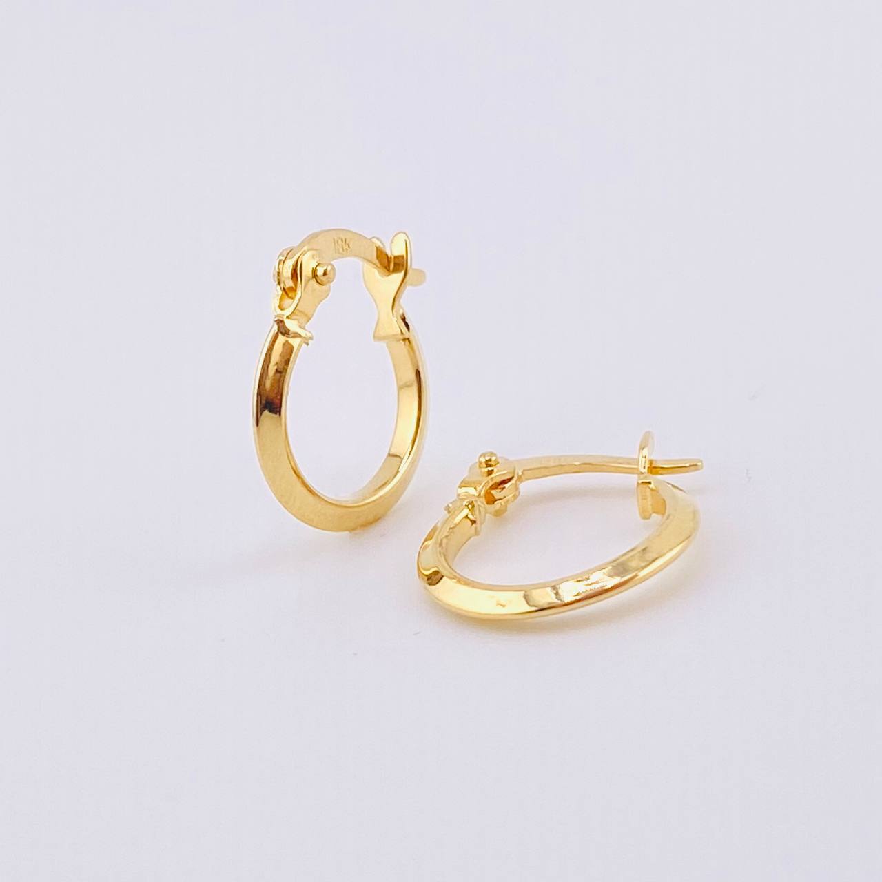 Candongas Clau 0.7gr / 1/2 in / Oro Amarillo 18K