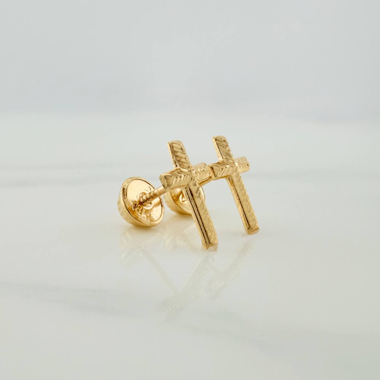 Topos Cruz 0.6gr / 10.34mm Oro Amarillo 18K %