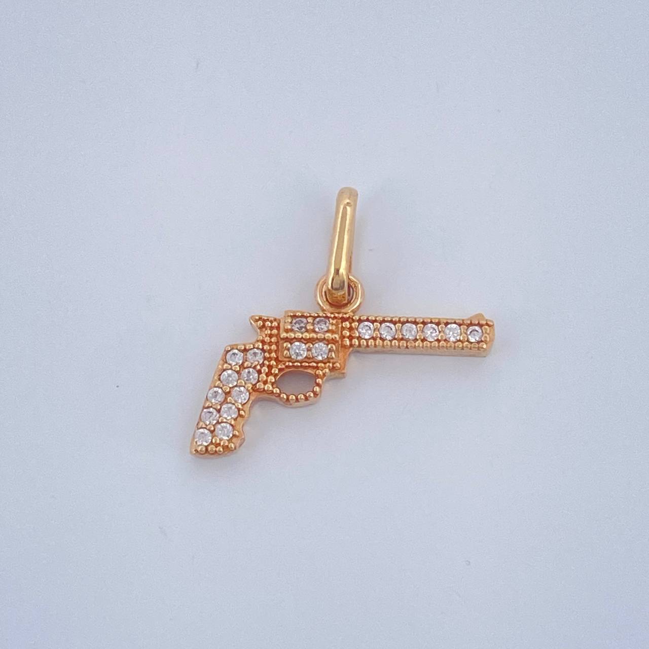 Dije Revolver 1.05gr / 3/4 in / Oro Amarillo 18K $