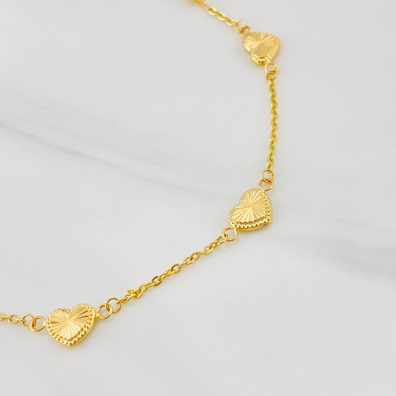Pulso Aro Seguido Corazones 2.25g / 7 3/4 in / 1.15mm Oro Amarillo 18K