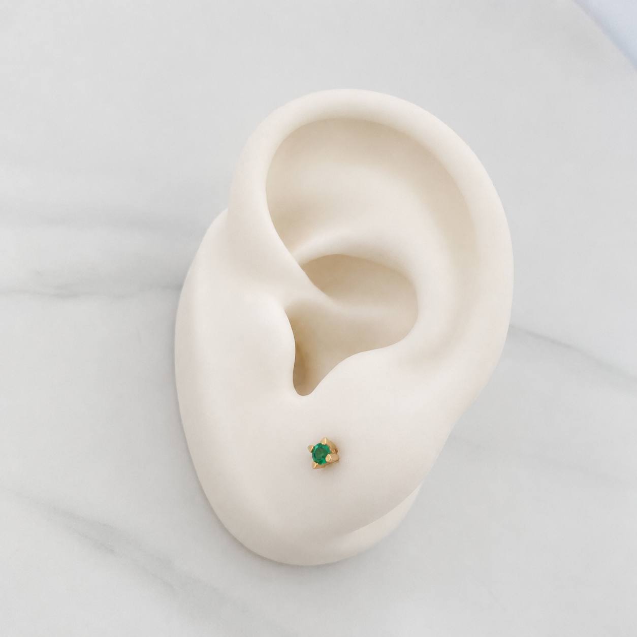 Stud Earrings Four Prongs Emerald 12pts 0.75g / in / 2mm Yellow Gold 18K